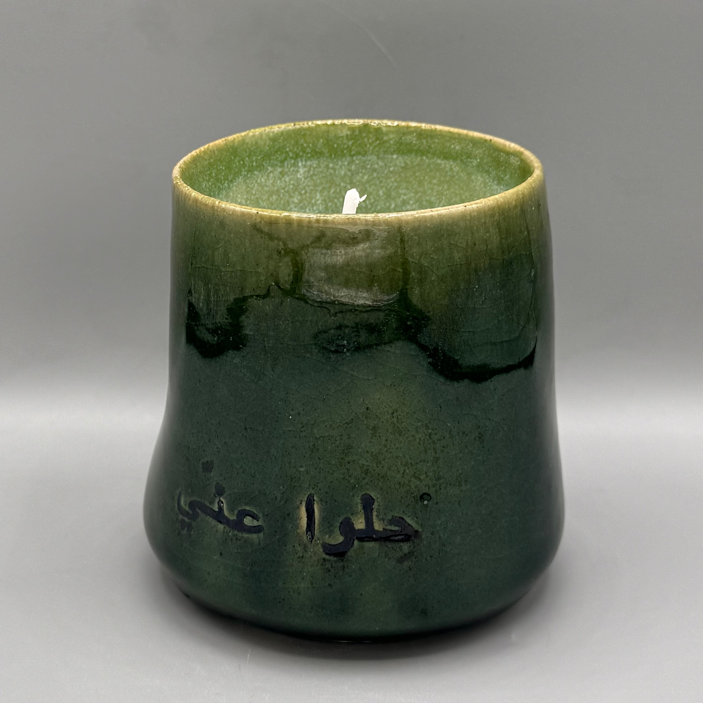 Thumb candle cup