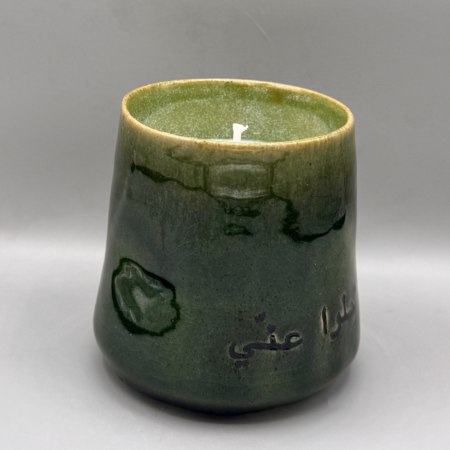 Thumb candle cup