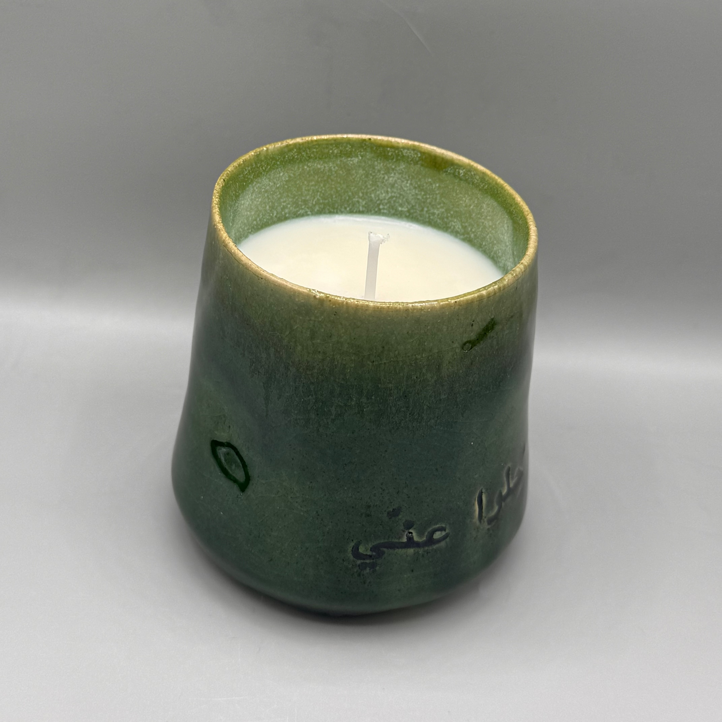 Thumb candle cup