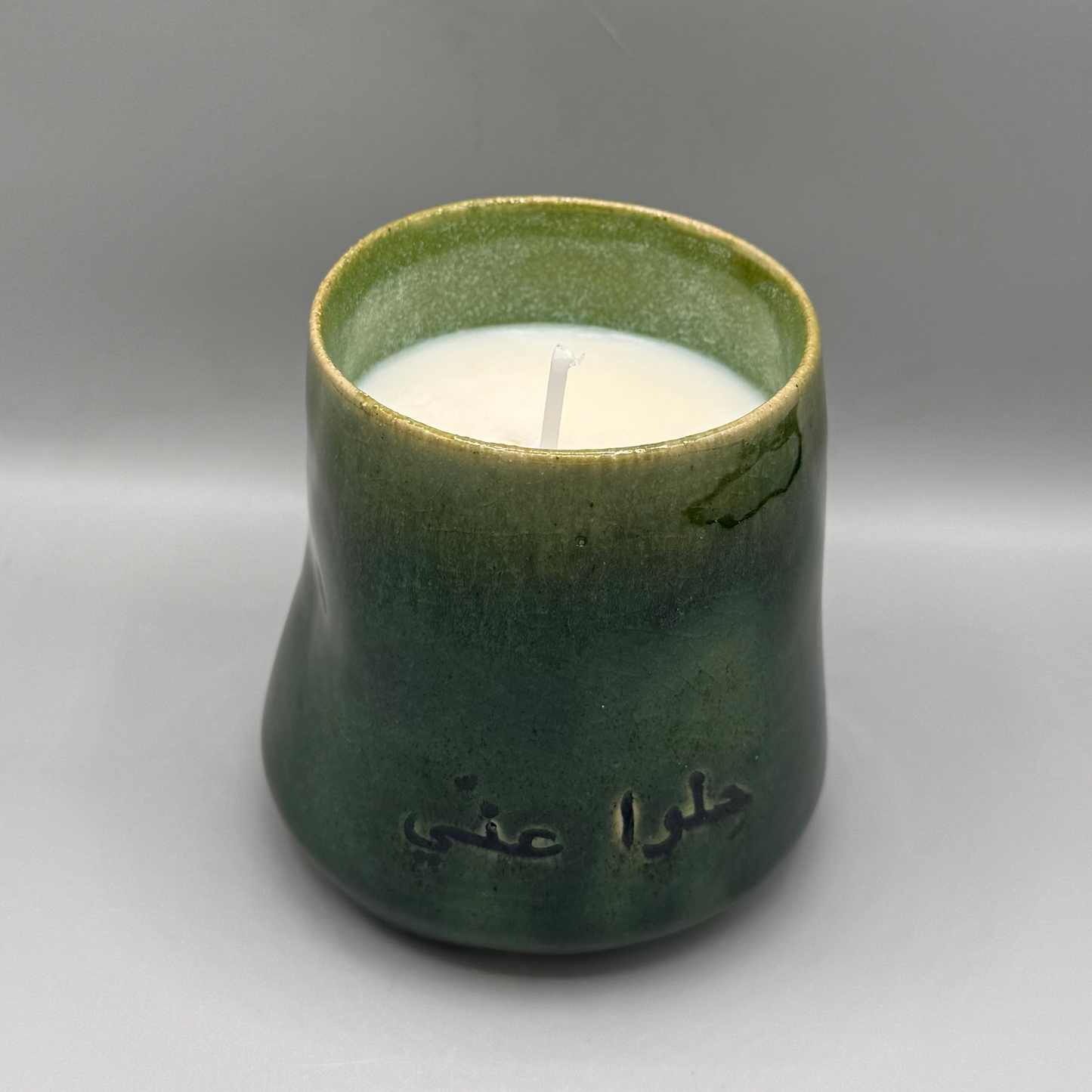 Thumb candle cup